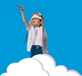 child holding airplane toy